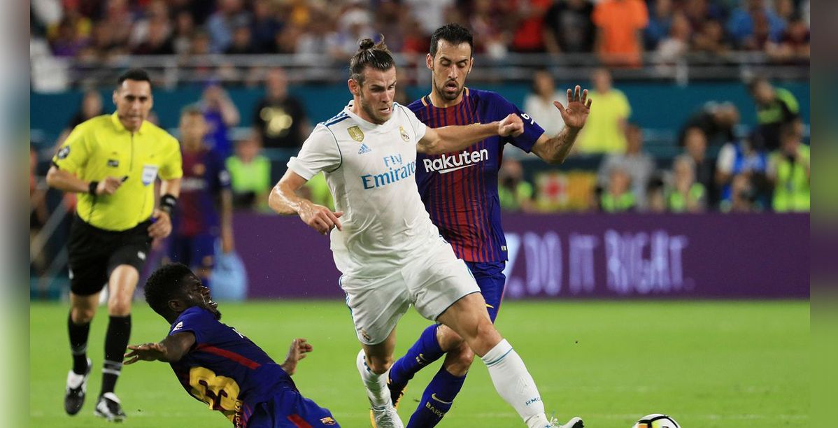 عدد بطولات برشلونة وريال مدريد