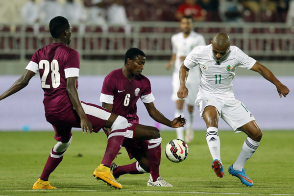 من مباراة المنتخب القطري ونظيره الجزائري